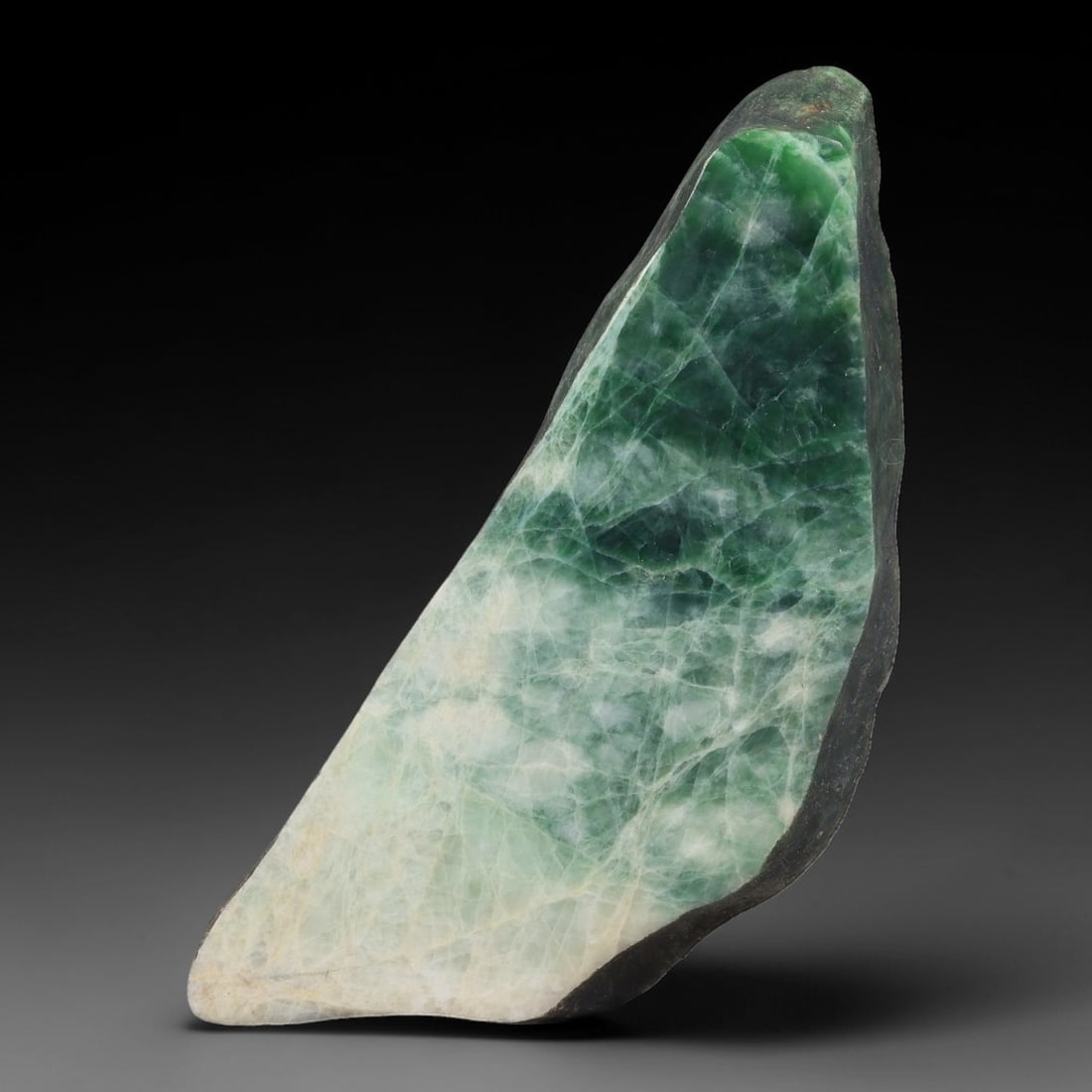 270ct Natural Type A Burmese Jadeite Jade Sliced Rough, 14AZ: This specimen is a sliced rough block of natural Type A Burmese jadeite jade. The interior displays natural colour zoning with visible mineral veining and crystalline patterns typical of unprocessed j