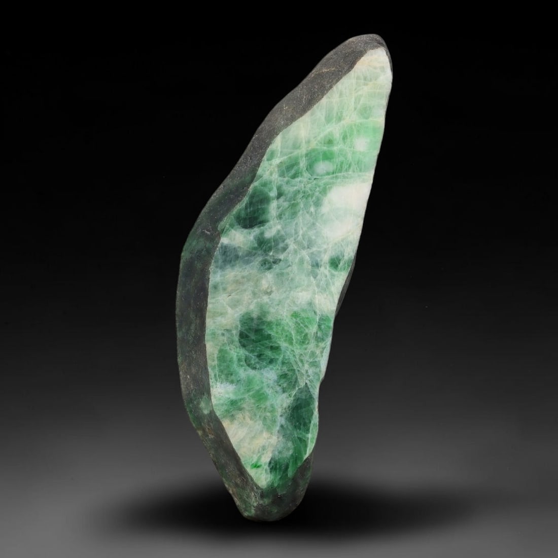 185ct Natural Type A Burmese Jadeite Jade Sliced Rough, 15AZ: This specimen is a sliced rough block of natural Type A Burmese jadeite jade. The interior displays natural colour zoning with visible mineral veining and crystalline patterns typical of unprocessed j