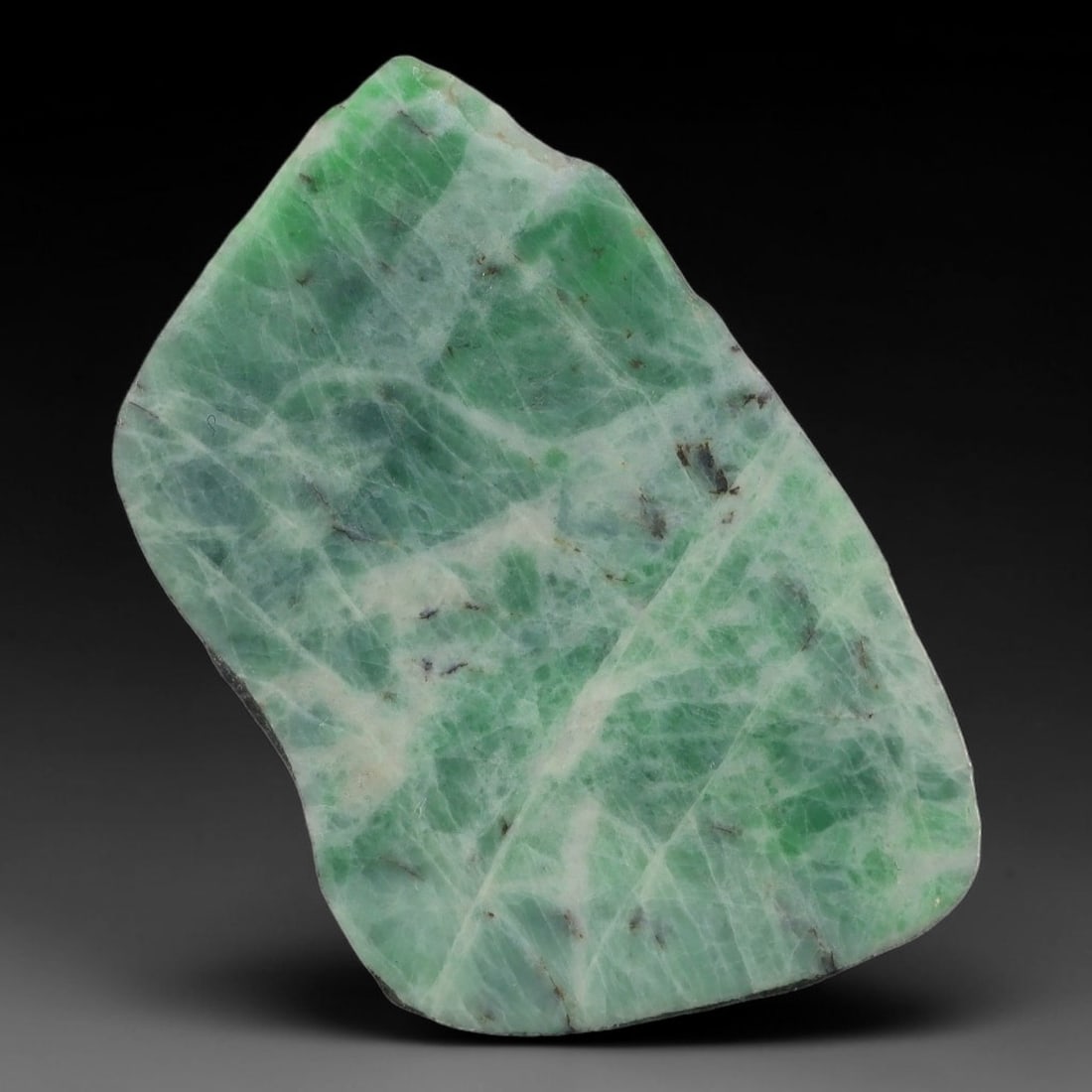 146ct Natural Type A Burmese Jadeite Jade Sliced Rough, 18YN: This specimen is a sliced rough block of natural Type A Burmese jadeite jade. The interior displays natural colour zoning with visible mineral veining and crystalline patterns typical of unprocessed j