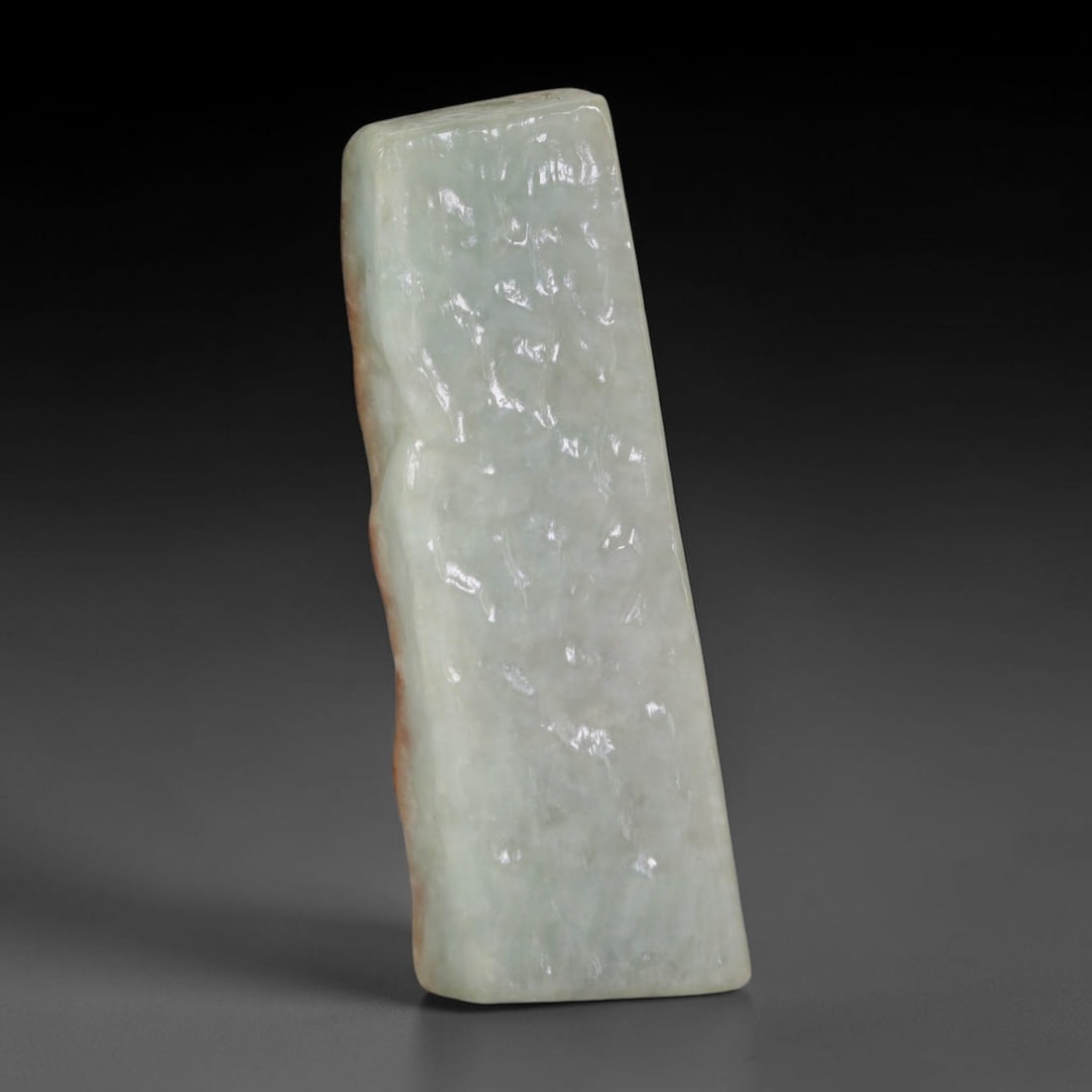 300ct Natural Type A Burmese Jadeite Jade Polished Sliced Rough, 98AZ: This specimen is a sliced rough block of natural Type A Burmese jadeite jade. The interior displays natural colour zoning with visible mineral veining and crystalline patterns typical of unprocessed j