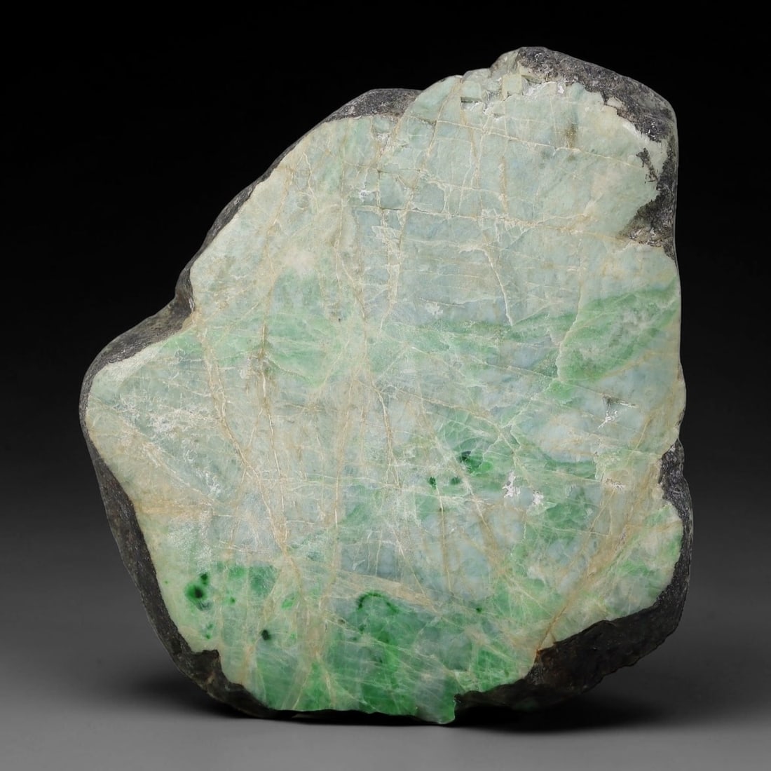 415ct Natural Type A Burmese Jadeite Jade Sliced Rough, 2YK: This specimen is a sliced rough block of natural Type A Burmese jadeite jade. The interior displays natural colour zoning with visible mineral veining and crystalline patterns typical of unprocessed j