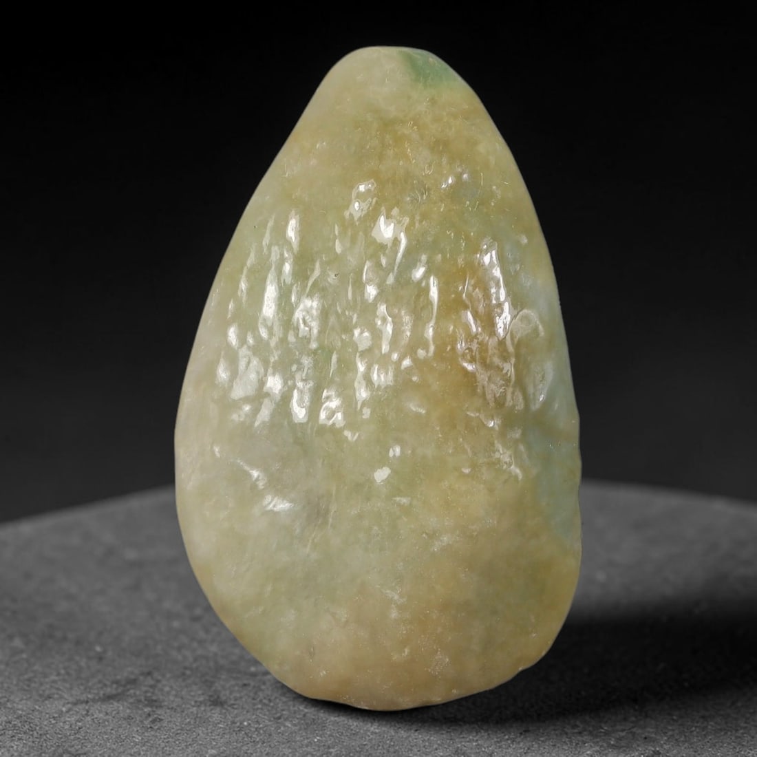 103ct Natural Type A Burmese Jadeite Jade Polished Sliced Rough, 76AZ: This specimen is a sliced rough block of natural Type A Burmese jadeite jade. The interior displays natural colour zoning with visible mineral veining and crystalline patterns typical of unprocessed j