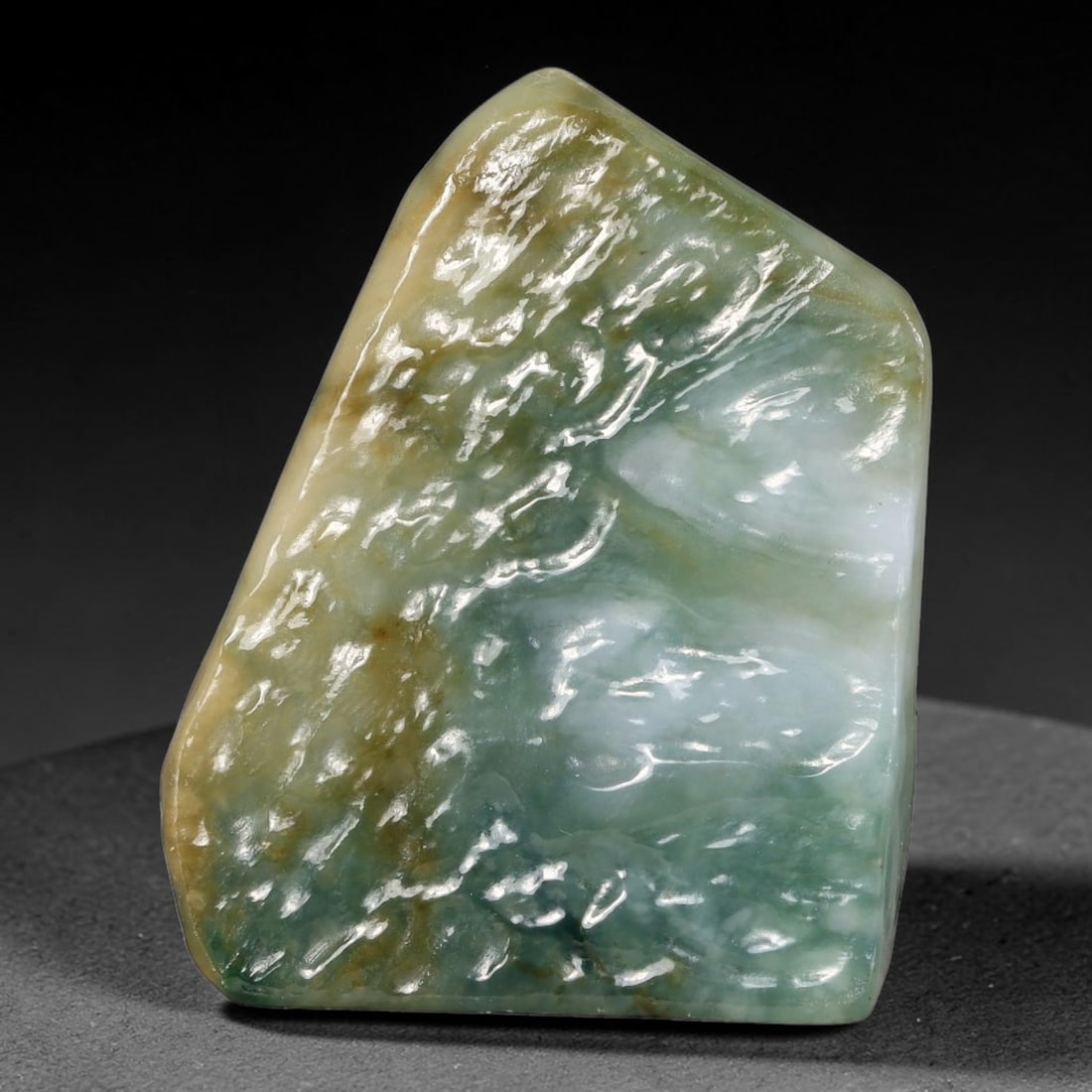 300ct Natural Type A Burmese Jadeite Jade Polished Sliced Rough, 38YN: This specimen is a sliced rough block of natural Type A Burmese jadeite jade. The interior displays natural colour zoning with visible mineral veining and crystalline patterns typical of unprocessed j