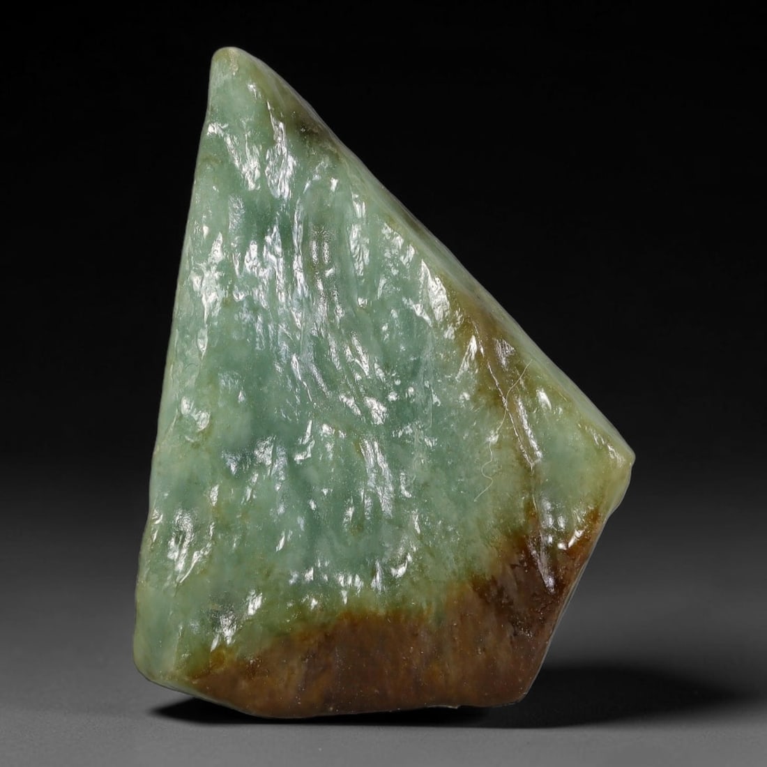 249ct Natural Type A Burmese Jadeite Jade Polished Sliced Rough, 39YN: This specimen is a sliced rough block of natural Type A Burmese jadeite jade. The interior displays natural colour zoning with visible mineral veining and crystalline patterns typical of unprocessed j