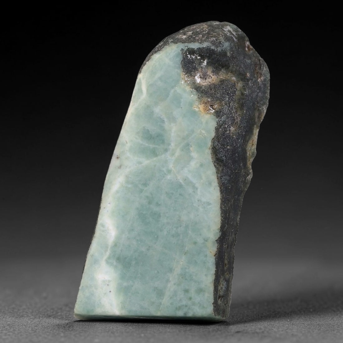 139ct Natural Type A Burmese Jadeite Jade Sliced Rough, 92YN: This specimen is a sliced rough block of natural Type A Burmese jadeite jade. The interior displays natural colour zoning with visible mineral veining and crystalline patterns typical of unprocessed j