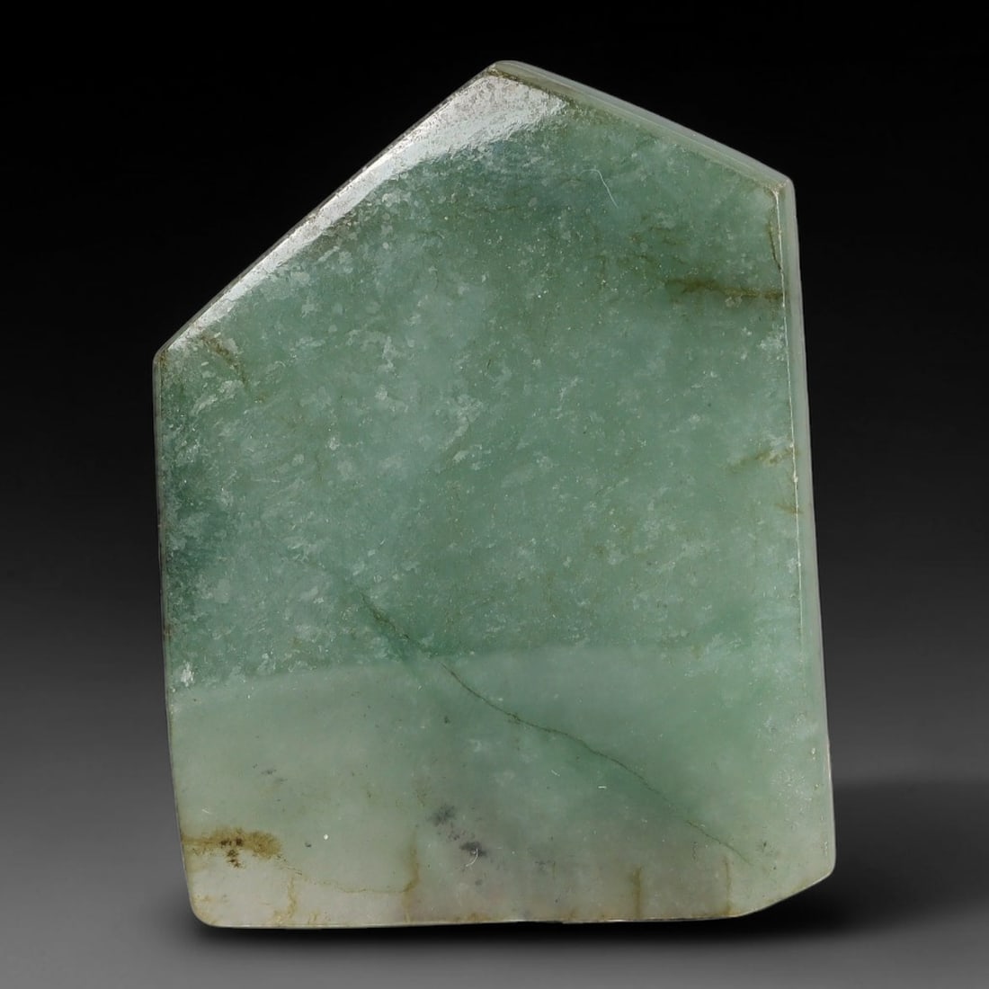 122ct Natural Type A Burmese Jadeite Jade Polished Sliced Rough, 21YN: This specimen is a sliced rough block of natural Type A Burmese jadeite jade. The interior displays natural colour zoning with visible mineral veining and crystalline patterns typical of unprocessed j