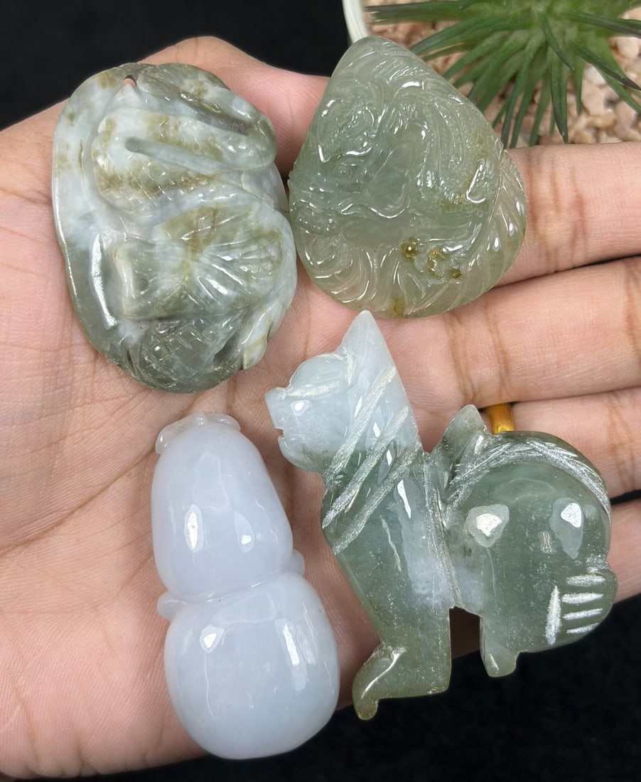 Lot Of 4 Natural Burmese Type A Jadeite Jade Carved Pendants, 91AR: This four-piece set includes hand-carved pendants crafted from untreated natural Type A Burmese jadeite jade, featuring varied traditional Chinese auspicious motifs: coiled serpent carving, detailed m