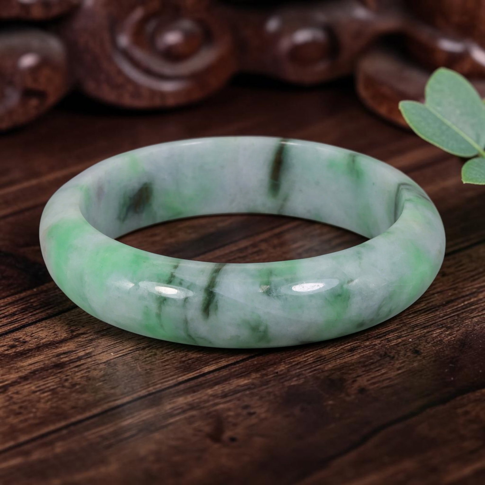 Natural Burmese Type A Striped Green Jadeite Jade Bangle Bracelet, 11YM: Crafted from natural Burmese Type A jadeite jade, this extra-wide bangle features vivid bright green streaks paired with dark vertical veins across a pale milky white base, forming a distinctive strip