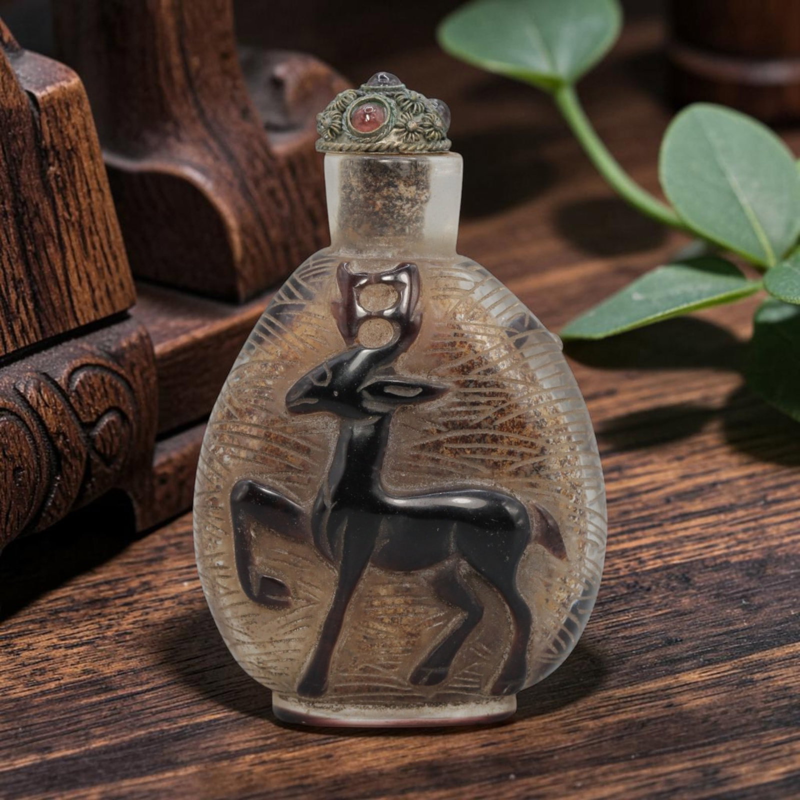 Vintage Chinese Overlay Liuli Snuff Bottle - Deer & Crane Motif, 74YF: Crafted from frosted translucent glass with contrasting dark overlay, this vintage Chinese snuff bottle features two-sided relief carving. One side depicts a prancing deer, while the other features a 