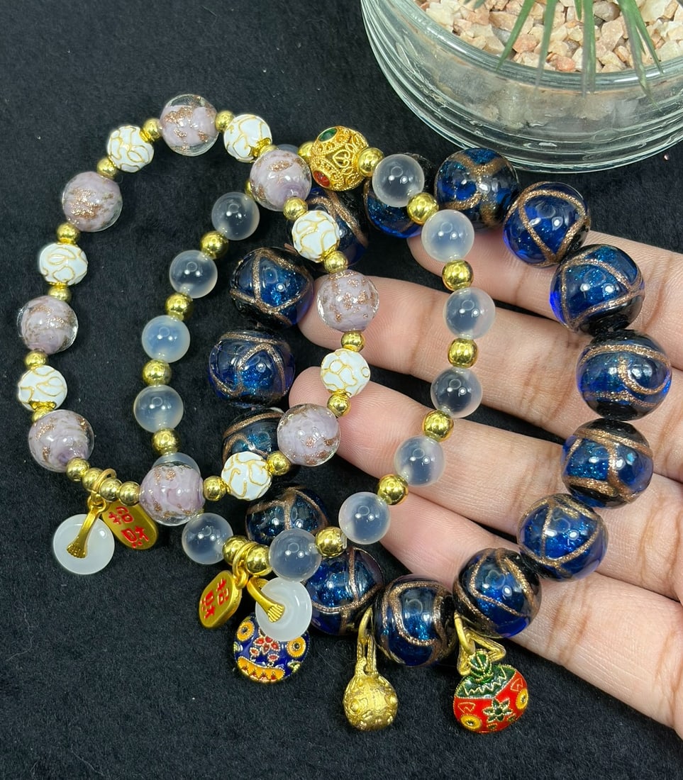 Lot of 3 Chinese Style Gold Foil Lampwork Glass Bead Charm Bracelets, 84AS: Set of 3 handmade stretch glass bead bracelets featuring classic oriental design elements. Each bracelet is constructed with premium lampwork glass beads including deep blue gold-lined marbled spheres