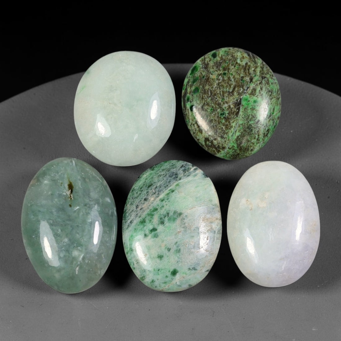5pcs 146ct Natural Burmese Type A Multi Tone Ice Speckled Jadeite Jade Cabochonsc, 79AV: This wholesale bulk set contains 5 fully untreated natural Burmese Type A oval jadeite jade cabochons with a total combined weight of 146ct, the largest piece measuring 29x19mm. The lot features varie