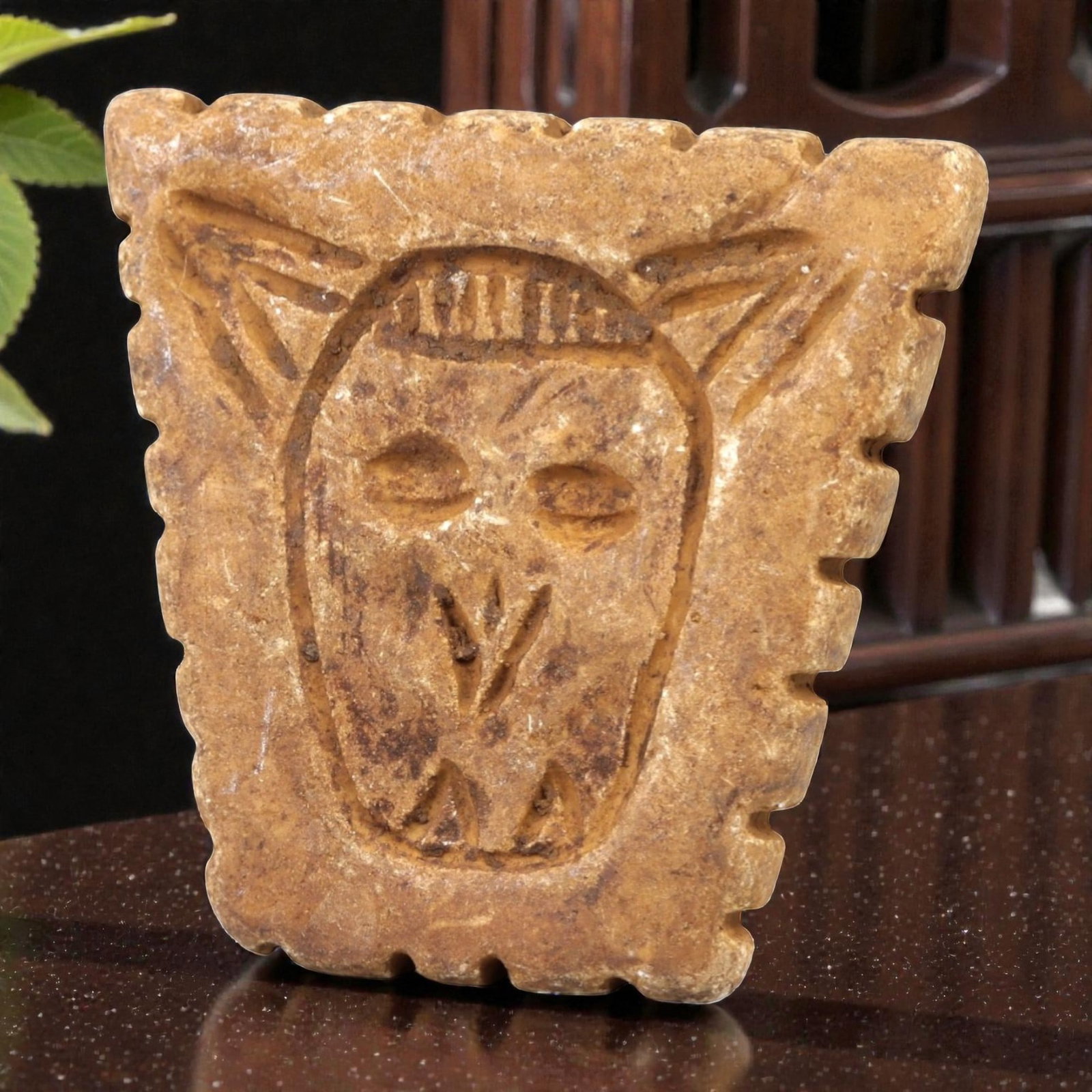 Ancient Stone Stamp Seal - Near Eastern Figurine, 78AL: Carved from tan speckled stone, this stamp seal consists of two distinct components: a rectangular base with incised linear edge detailing and a raised animal-headed finial, likely a bovine or caprid,