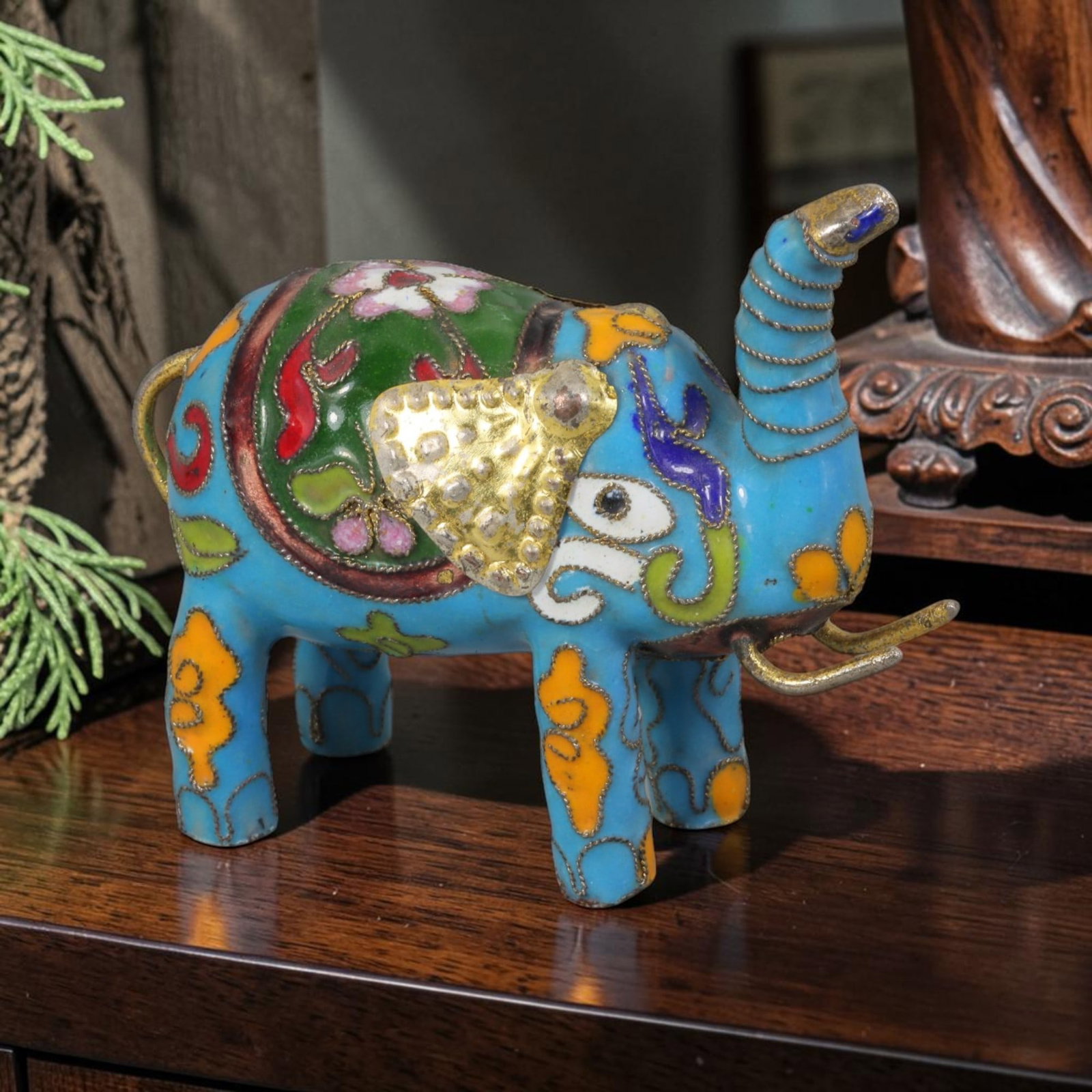 Vintage Chinese Cloisonne Blue Elephant Figurine - Floral Gilded Wire Animal Ornament, 51AR: Handcrafted copper cloisonne elephant statuette measuring 7cm long and 5cm tall, sculpted with its trunk raised upward as a classic auspicious symbol. The body is covered in bright sky-blue enamel ove
