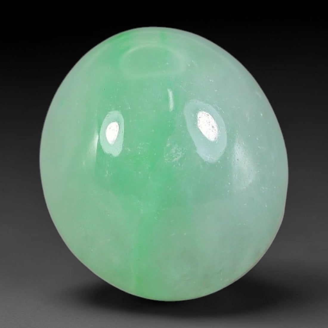 6.00ct Natural Burmese Type A Apple Green Jadeite Jade Cabochon, 77FA: This single loose natural Burmese Type A apple green jadeite jade cabochon, completely untreated, free of artificial dye, bleaching, or resin filling, preserving the original natural mineral crystal s