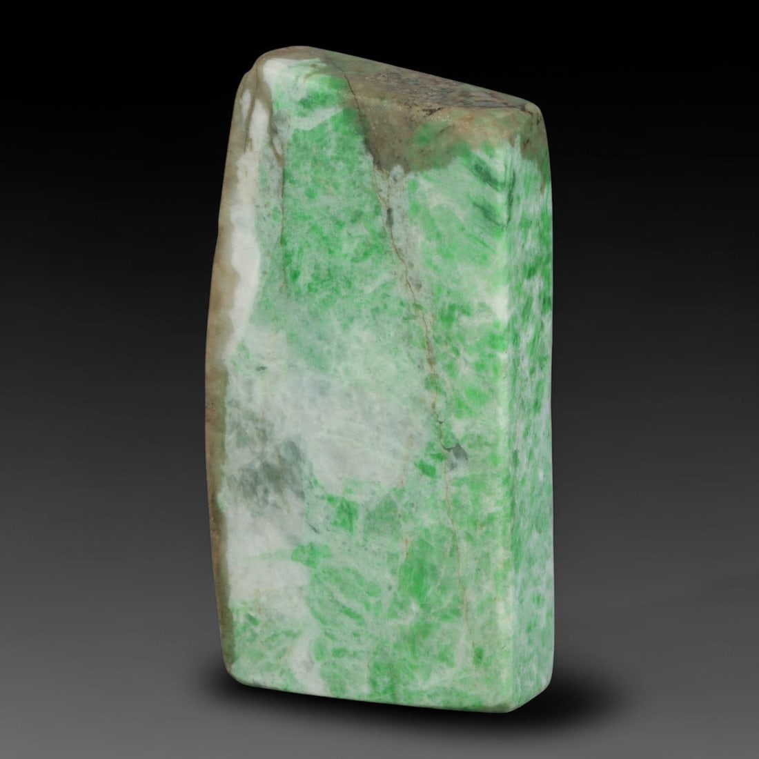 305ct Natural Type A Burmese Jadeite Jade Sliced Rough, 44YK: This specimen is a sliced rough block of natural Type A Burmese jadeite jade. The interior displays natural colour zoning with visible mineral veining and crystalline patterns typical of unprocessed j