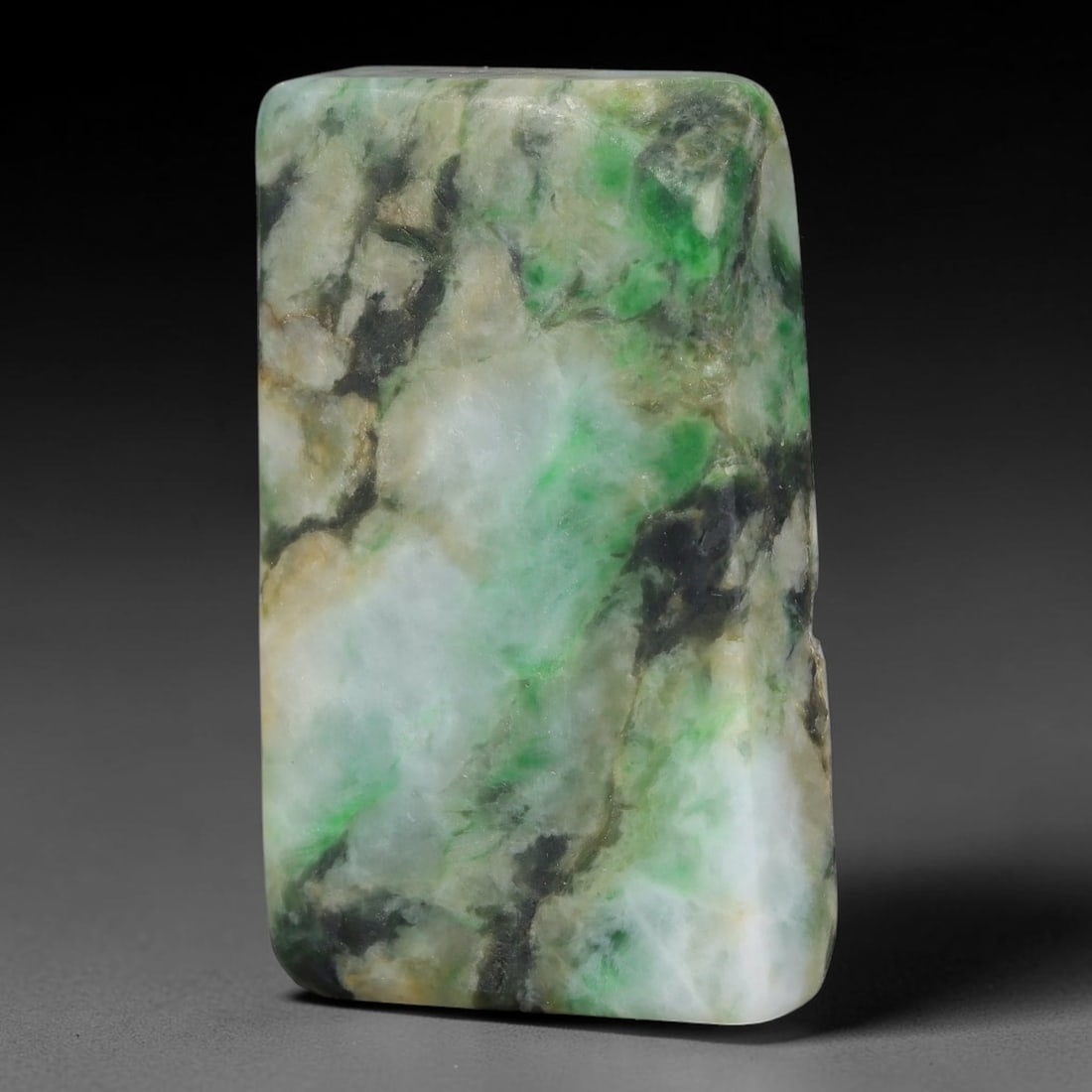 200ct Natural Type A Burmese Jadeite Jade Sliced Rough, 41YK: This specimen is a sliced rough block of natural Type A Burmese jadeite jade. The interior displays natural colour zoning with visible mineral veining and crystalline patterns typical of unprocessed j