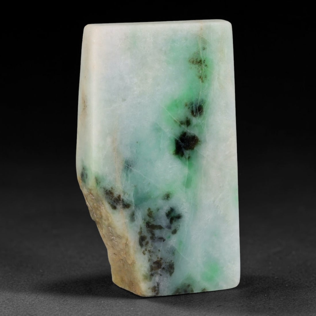 280ct Natural Type A Burmese Jadeite Jade Sliced Rough, 24YK: This specimen is a sliced rough block of natural Type A Burmese jadeite jade. The interior displays natural colour zoning with visible mineral veining and crystalline patterns typical of unprocessed j
