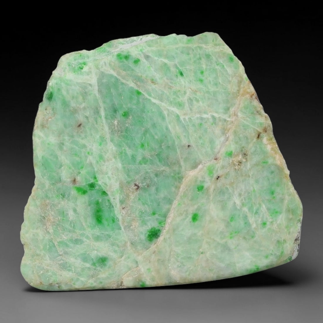 183ct Natural Type A Burmese Jadeite Jade Sliced Rough, 81YN: This specimen is a sliced rough block of natural Type A Burmese jadeite jade. The interior displays natural colour zoning with visible mineral veining and crystalline patterns typical of unprocessed j