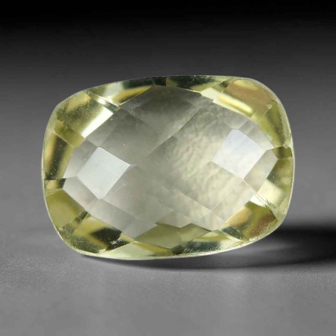 6.00 Carats Natural Lemon Quartz Cushion Checkerboard Faceted Gemstone, 15XZ: I've got a real nice little gem here to show you, this bright cushion cut lemon quartz with that soft sunny pale yellow glow we love. This single stone measures 14.1x10.2x6.1mm and weighs a full 6.00 