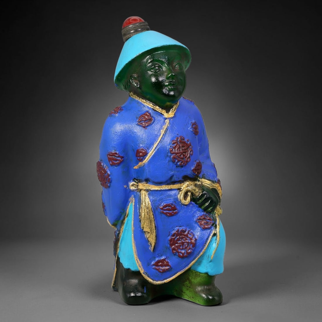 Vintage Chinese Liuli Glass Snuff Bottle - Qing Dynasty Official Figure, 88YF: This snuff bottle is moulded from translucent green liuli glass, shaped as a traditional Qing dynasty official figure complete with a long queue braid visible on the reverse. The robe is finished with