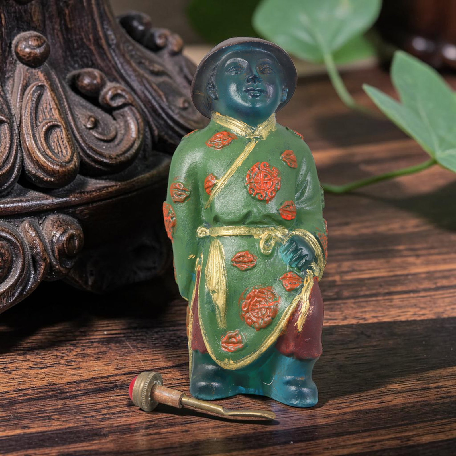 Vintage Chinese Liuli Glass Snuff Bottle - Painted Figure, 87YF: This snuff bottle is crafted from vibrant liuli glass, featuring a meticulously painted figure in traditional Chinese attire. The figure is adorned with intricate floral patterns in red and gold, show