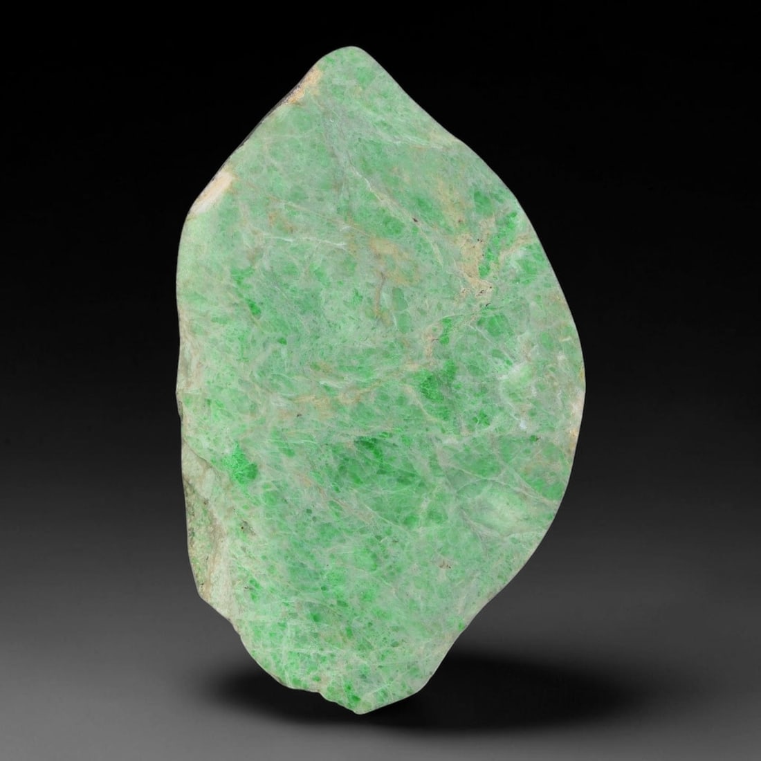 151ct Natural Type A Burmese Jadeite Jade Sliced Rough, 91YN: This specimen is a sliced rough block of natural Type A Burmese jadeite jade. The interior displays natural colour zoning with visible mineral veining and crystalline patterns typical of unprocessed j