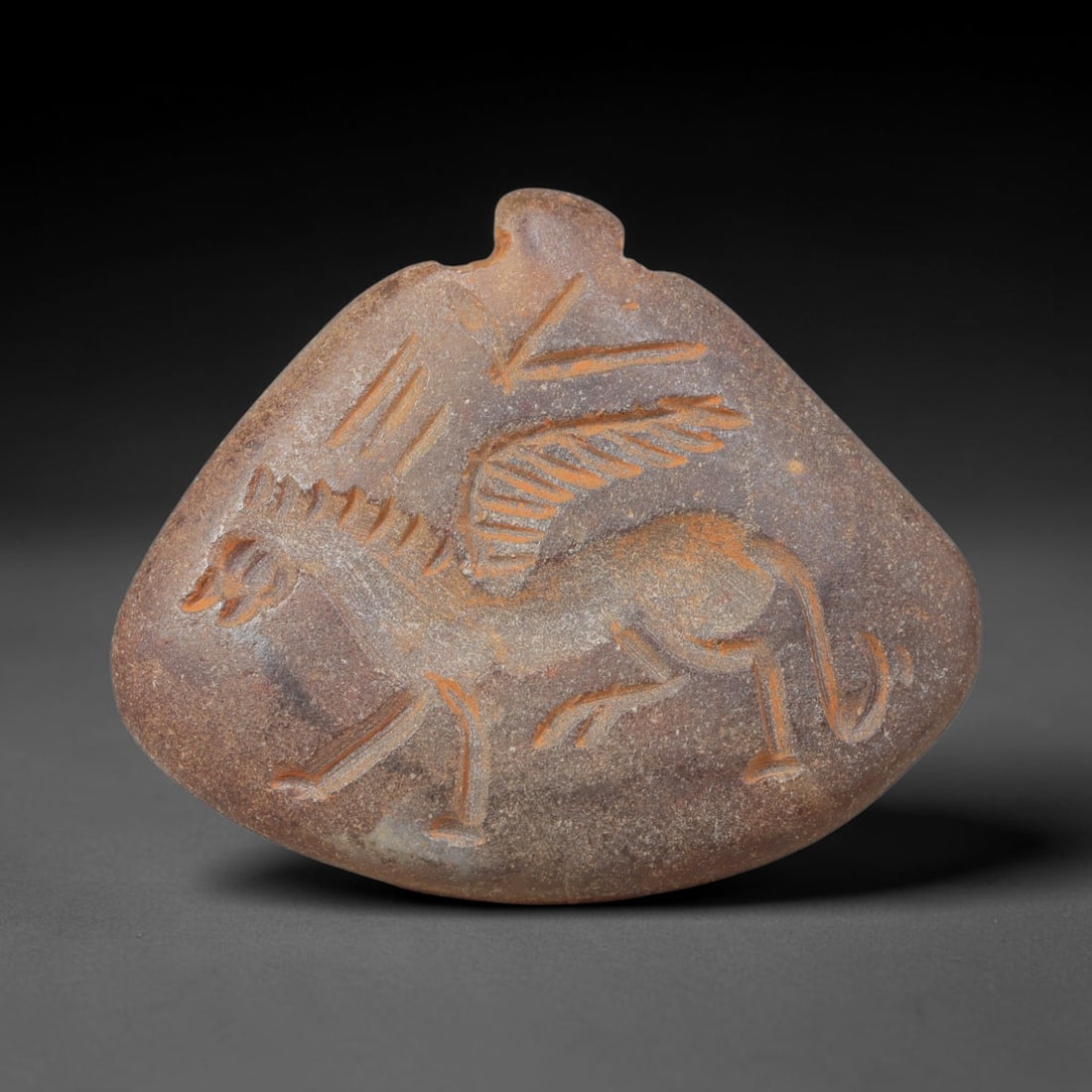 Ancient Sasanian Hand Engraved Chalcedony Plaque Amulet, 24WT: Mid-sized antique wearable sacred tablet expertly carved from natural translucent chalcedony mineral, originating from ancient Sasanian Persian cultural and devotional craft traditions. Chalcedony was