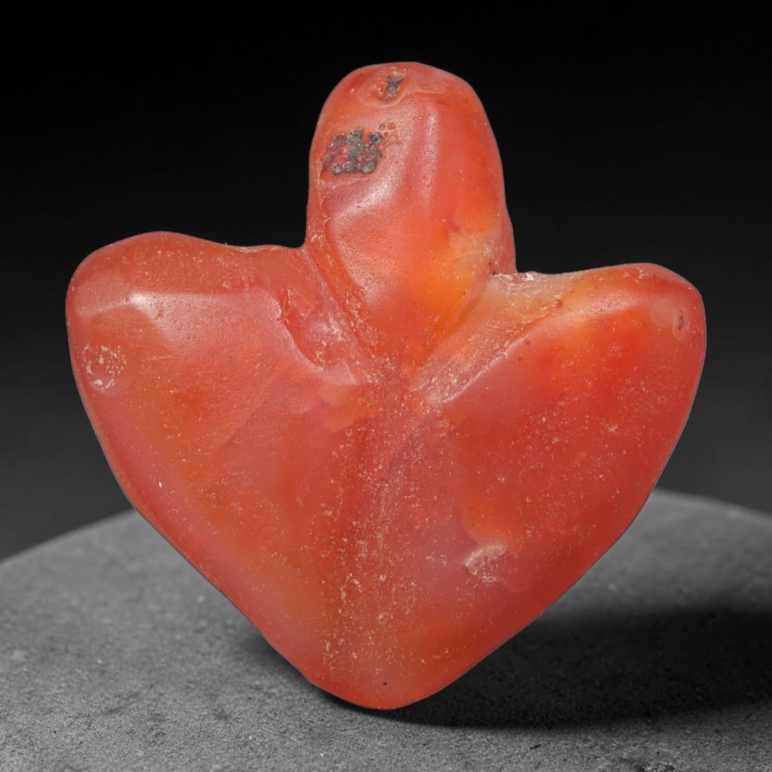 Ancient Coptic Egyptian Hand Polished Carnelian Amulet, 84XZ: Small antique wearable sacred talisman shaped from solid natural carnelian agate mineral, originating from Coptic Egyptian Nile Valley cultural and devotional traditions. Carnelian was an exceptionall