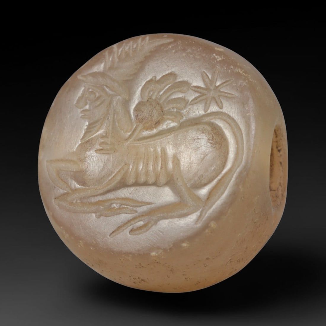 Ancient Sasanian Hand Engraved Translucent Stone Stamp Seal Talisman, 14WT: Miniature antique perforated sealing artifact expertly worked from natural pale translucent chalcedony mineral, originating from ancient Sasanian Persian imperial craft and cultural traditions. Fine t