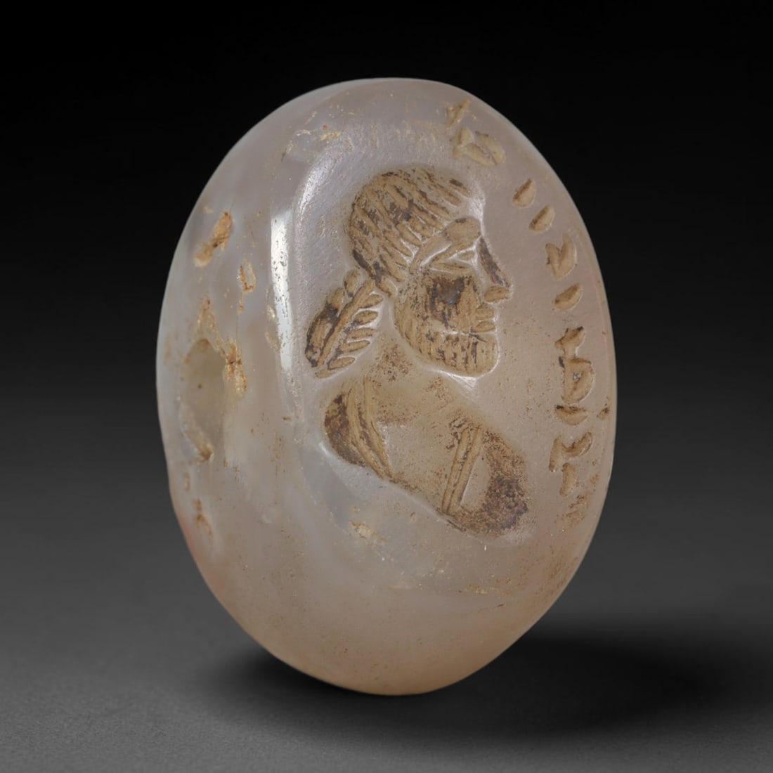 Ancient Sasanian Hand Engraved Translucent Stone Stamp Seal Talisman, 12WT: Miniature antique perforated sealing artifact expertly worked from natural pale translucent chalcedony mineral, originating from ancient Sasanian Persian imperial craft and cultural traditions. Fine t