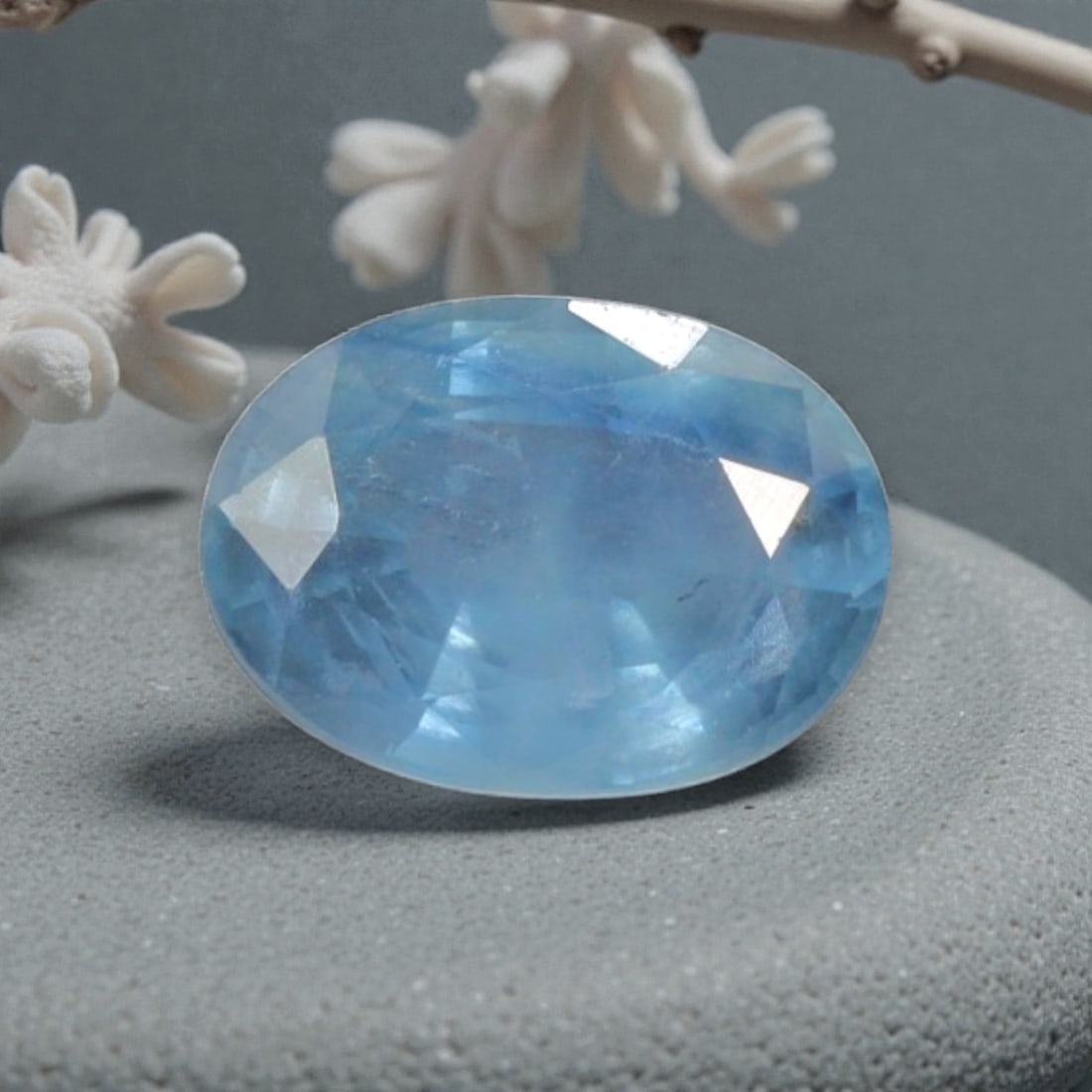 0.97 Carats Natural Blue Sapphire Faceted Loose Gemstone, 63YE: This specimen is composed of natural sapphire, finished with uniform faceting to encourage light refraction through its crystalline interior. The mineral holds soft blue colour saturation with gentle 
