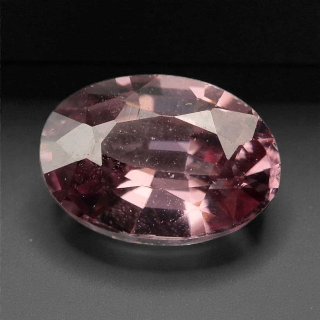 1.10 Carats Mauve Pink Zircon - Natural Cambodian Stone , 48WE: This alluring zircon glows with a romantic mauve pink tone, displaying delicate flashes of lavender and rose under light. Its high refractive index delivers the characteristic brilliance zircon is kno