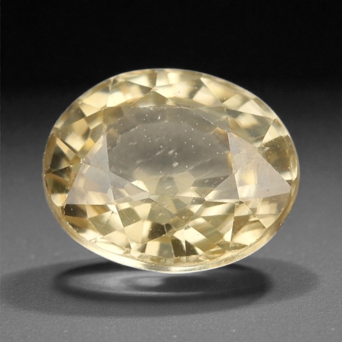 1.60 Carats Light Champagne Zircon - Natural Cambodian Stone , 19WE: Soft and luminous, this light champagne zircon radiates with a delicate golden glow that evokes understated elegance. Its oval cut amplifies the stone's natural brilliance, allowing light to ripple th