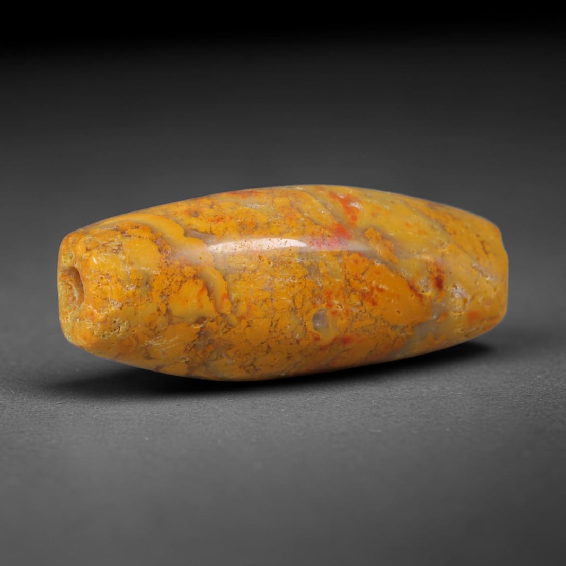 Ancient Scythian / Saka Steppe Nomad Cultures Banded Agate Cylinder Bead (900-200 BCE), 85XD: This antique banded agate cylinder bead originates from Scythian / Saka Steppe Nomad Cultures, Eurasian steppe peoples who carved distinctive earth-toned agate beads as elite burial adornment and pers