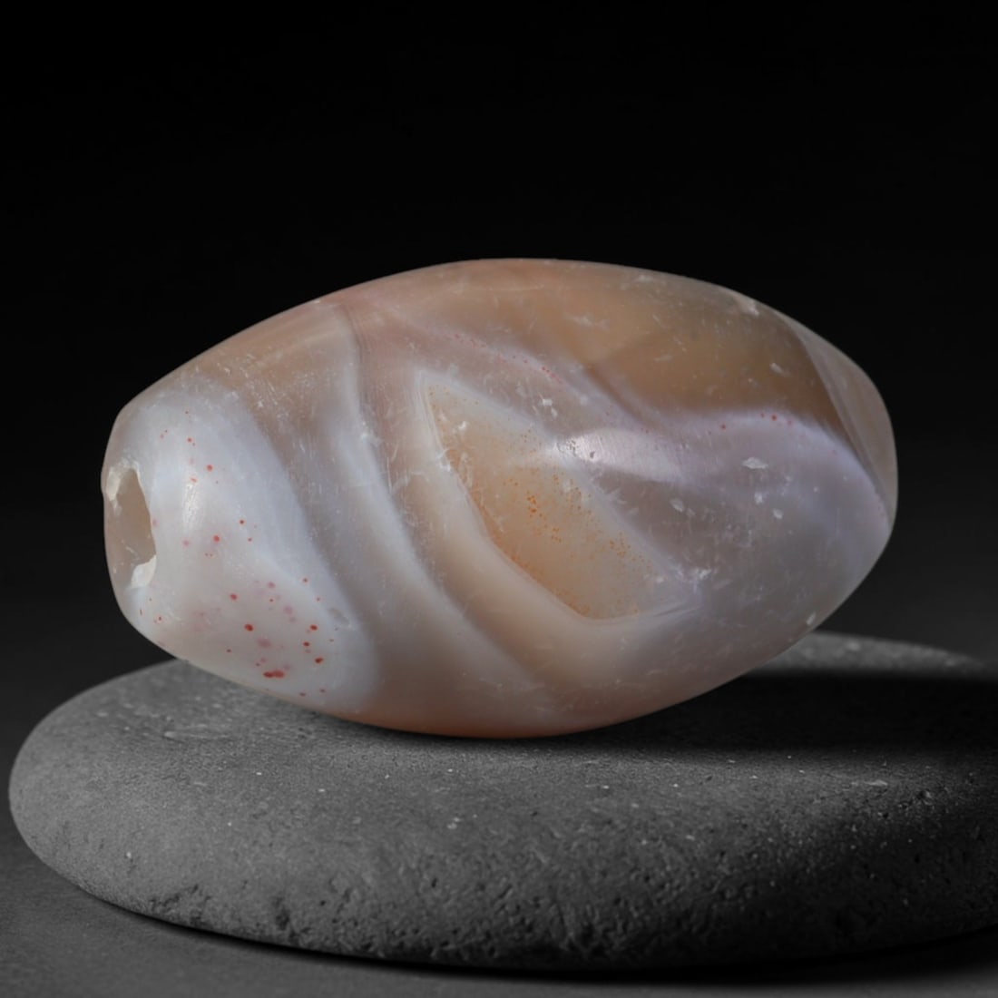 Ancient Sasanian Persian Empire Banded Agate Barrel Bead (224-651 CE), 81XD: This antique banded agate barrel bead originates from the Sasanian Persian Empire, a late antique West Asian culture renowned for refined agate talisman and court jewelry production along Persian Gulf