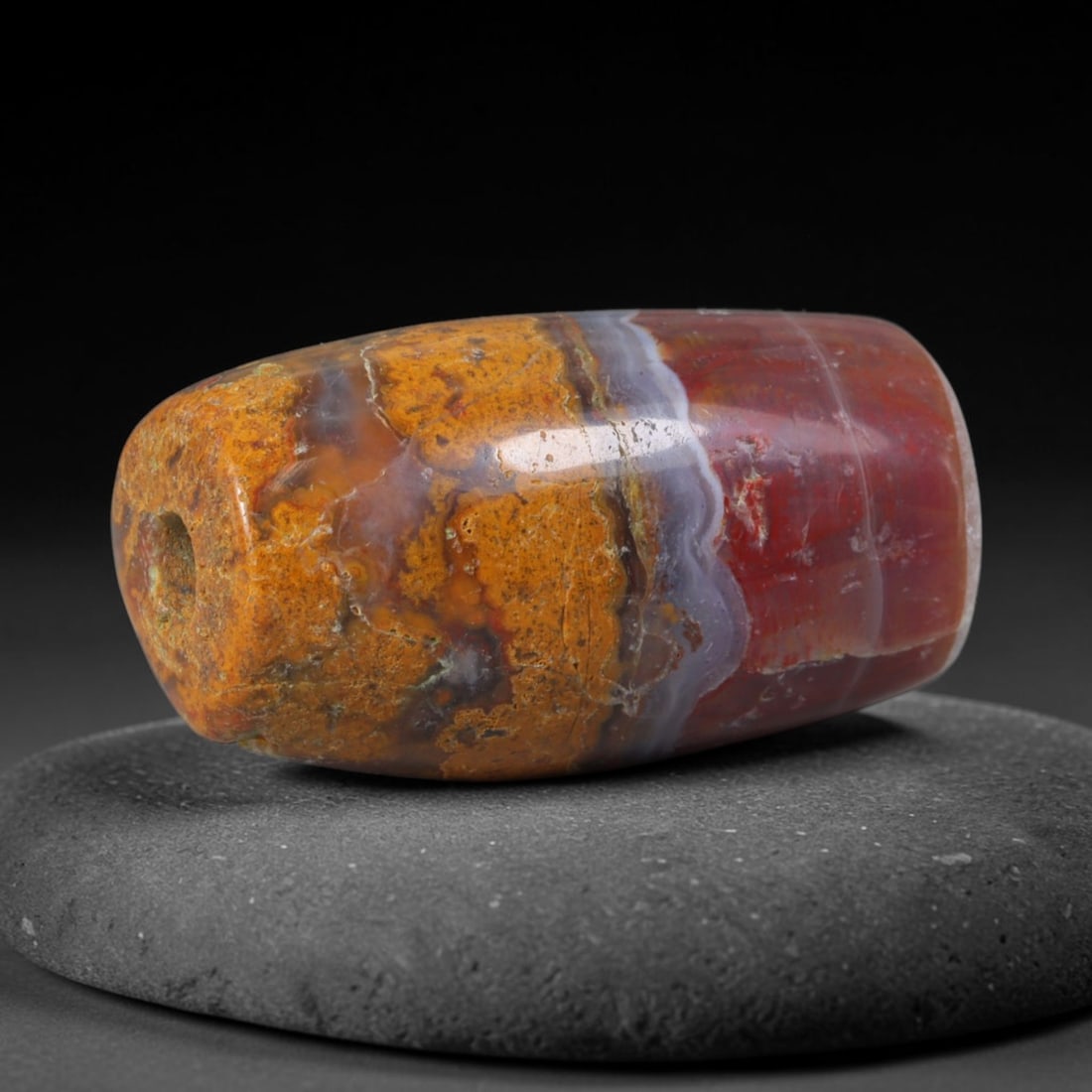 Ancient Babylonian & Kassite Cultures Banded Agate Cylinder Bead (1900-600 BCE), 84XD: This antique banded agate cylinder bead originates from Babylonian & Kassite Cultures, prominent Mesopotamian artisans who crafted vivid multi-toned agate beads as temple offerings and royal burial re