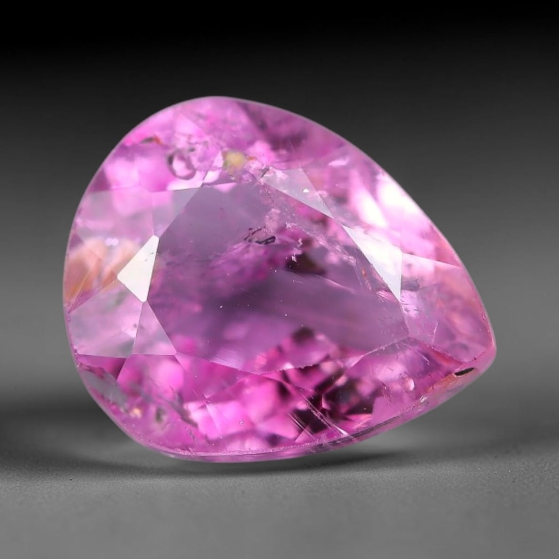 1.56 Carats Natural Bubblegum Pink Pear Shape Tourmaline Loose Faceted Gemstone, 97XZ: Natural vivid bubblegum pink elbaite tourmaline precision cut into a pear faceted loose gemstone, crafted with mixed brilliant facets to amplify bright pink luster and light dispersion. The stone feat
