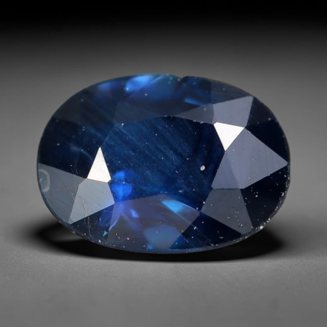 0.80 Carats Natural Deep Royal Blue Sapphire Oval Loose Faceted Gemstone, 94XV: Natural rich deep royal blue corundum sapphire precision cut into an oval faceted loose gemstone, crafted with mixed brilliant facets to amplify intense saturated navy blue color and crisp light retur