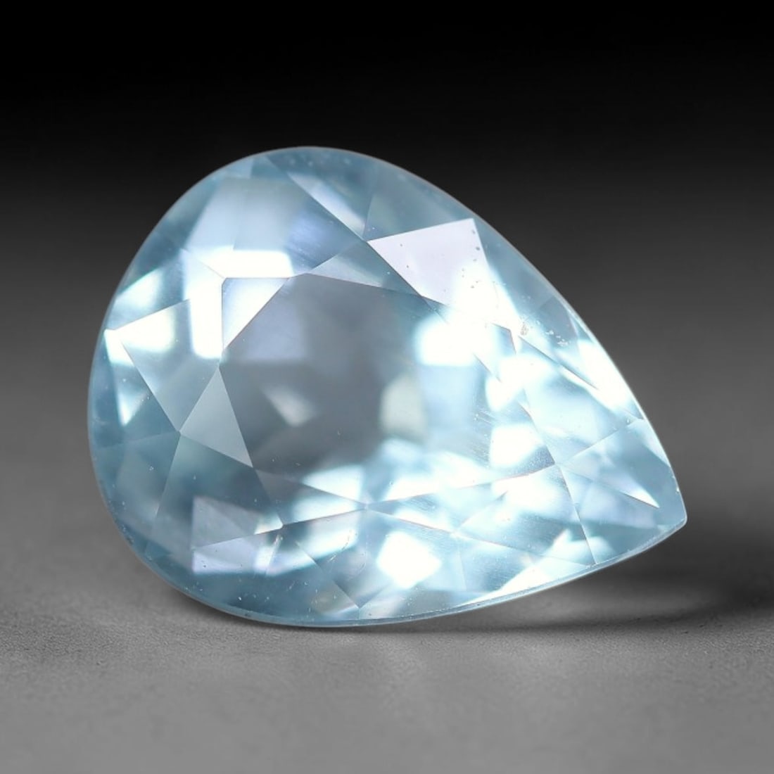 1.62 Carats Natural Pale Sky Blue Pear Aquamarine Loose Faceted Gemstone, 95XV: Natural cool pale sky blue aquamarine (beryl) precision cut into a pear-shaped faceted loose gemstone, crafted with mixed brilliant facets to amplify icy blue transparency and crisp light sparkle. The