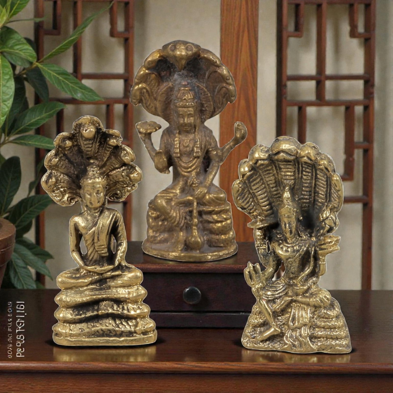 Thai Vintage Copper Alloy Naga Devotional Figures - 3pcs Set, 87ZB: This set of three devotional figures is crafted from copper alloy, displaying the warm golden patina and subtle surface wear of vintage Thai religious art. Each piece depicts a Hindu or Buddhist deity
