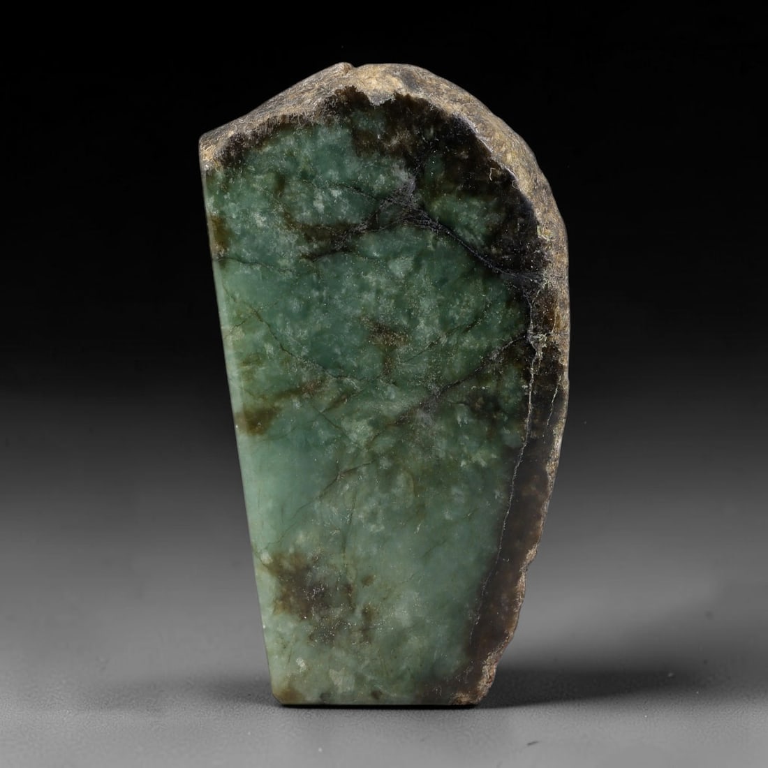 430ct Natural Type A Burmese Jadeite Jade Sliced Rough, 65YK: This specimen is a sliced rough block of natural Type A Burmese jadeite jade. The interior displays natural colour zoning with visible mineral veining and crystalline patterns typical of unprocessed j
