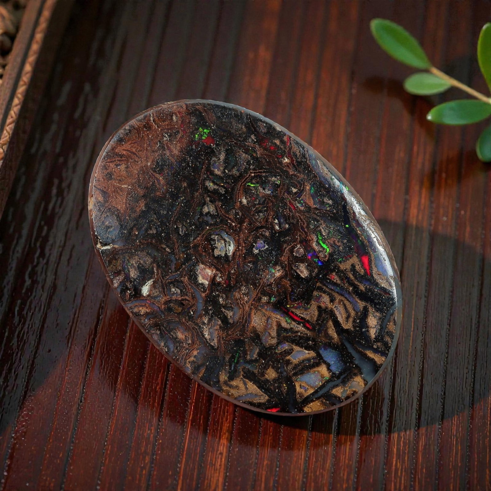 3.37 Carats Koroit Yowah Opal Cabochon - Natural Australian Single Stone, 77XL: This striking Koroit Yowah opal cabochon, measuring 12.5x8.8mm, features a dense, textured ironstone matrix in layered tones of deep chocolate brown, warm tan, and jet black. The stone's internal land