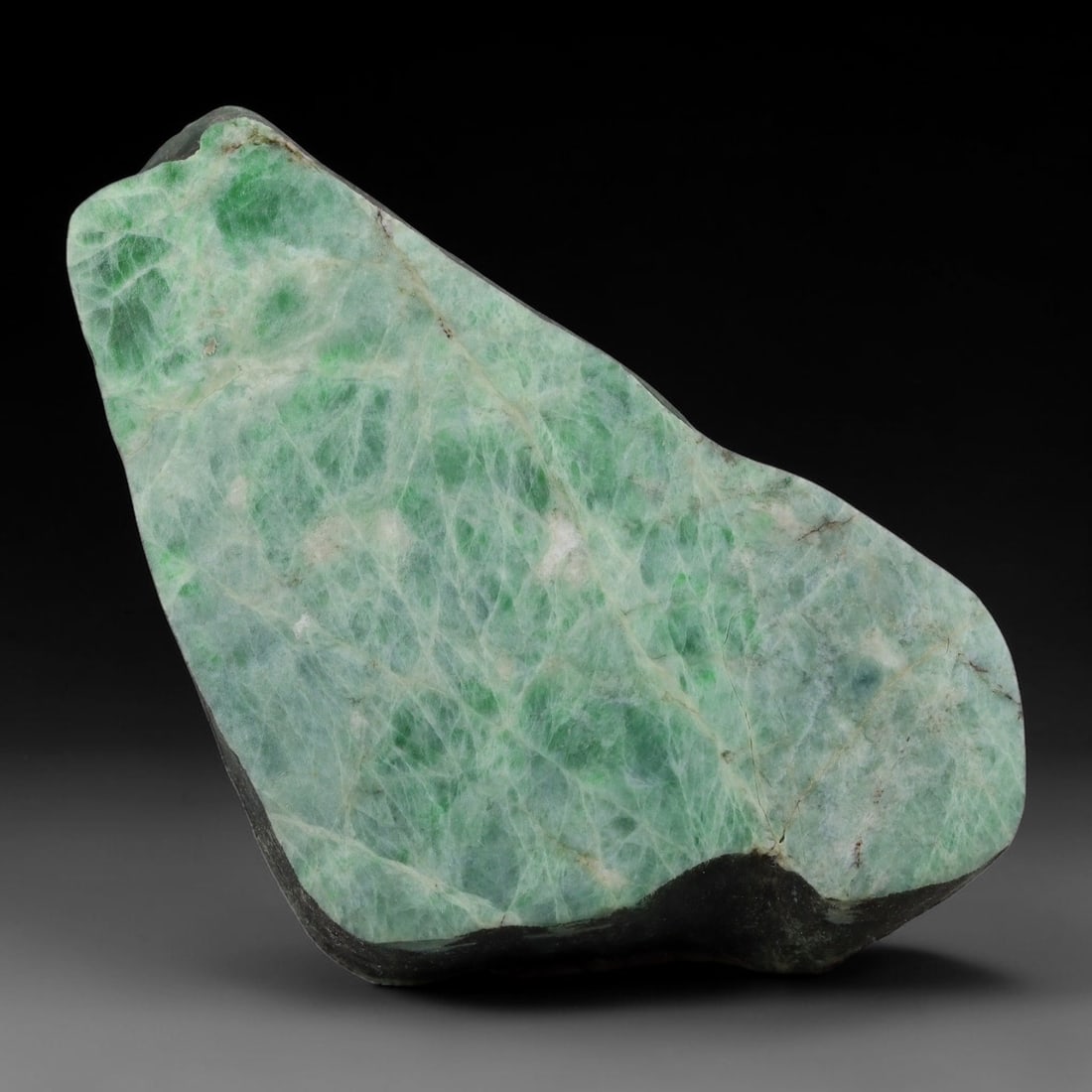 360ct Natural Type A Burmese Jadeite Jade Sliced Rough, 11YN: This specimen is a sliced rough block of natural Type A Burmese jadeite jade. The interior displays natural colour zoning with visible mineral veining and crystalline patterns typical of unprocessed j