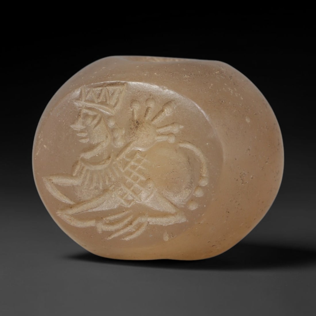 Ancient Sasanian Hand Engraved Translucent Stone Stamp Seal Talisman, 15WT: Miniature antique perforated sealing artifact expertly worked from natural pale translucent chalcedony mineral, originating from ancient Sasanian Persian imperial craft and cultural traditions. Fine t