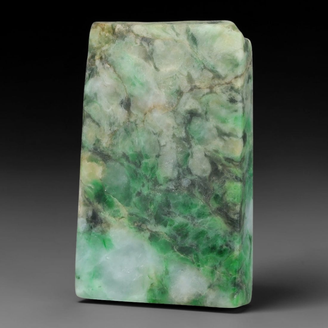 227ct Natural Type A Burmese Jadeite Jade Sliced Rough, 23YK: This specimen is a sliced rough block of natural Type A Burmese jadeite jade. The interior displays natural colour zoning with visible mineral veining and crystalline patterns typical of unprocessed j