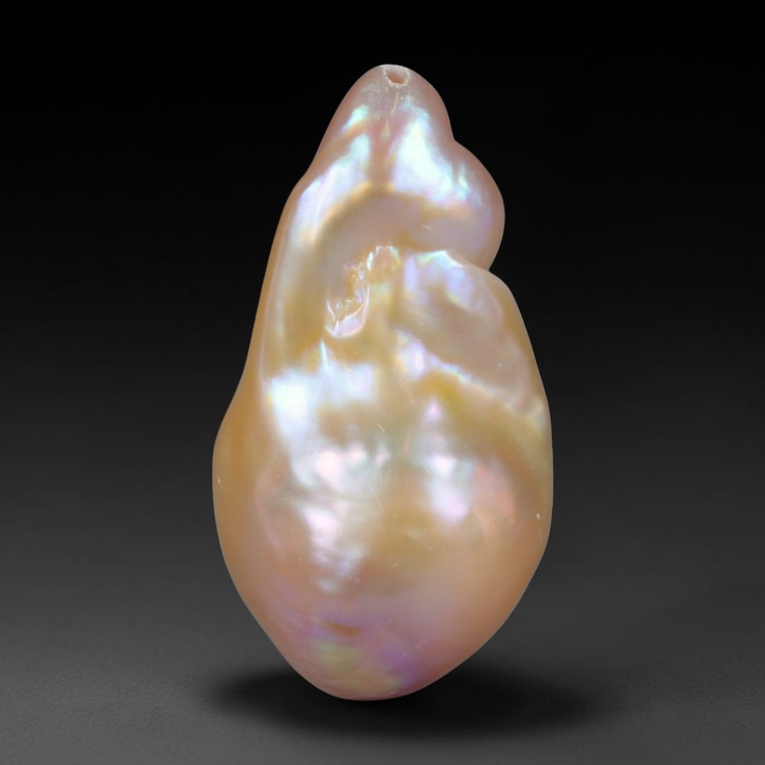Natural Freshwater Keshi Pearl Baroque Loose Pearl, 95WE: This natural freshwater keshi pearl presents an organic irregular baroque silhouette with rich shifting iridescent nacre displaying soft champagne, peach and lavender overtones across its surface. Sub