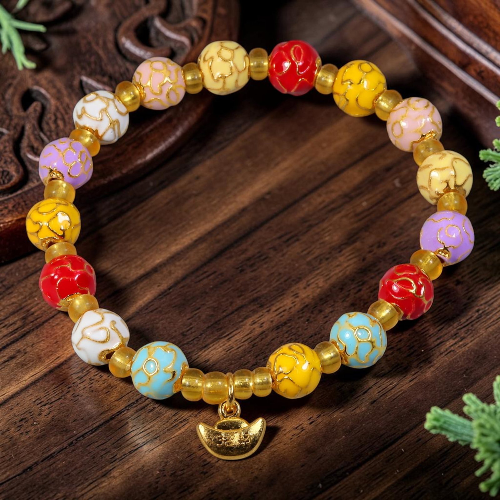 Chinese Cloisonne Enamel Beaded Bracelet - Multi Color Gold Ingot Wealth Charm, 80YG: This modern Chinese revival stretch bracelet features round cloisonne enamel beads measuring 7.40 millimeters, each finished in a distinct pastel and bold enamel hue detailed with raised gold-tone swi