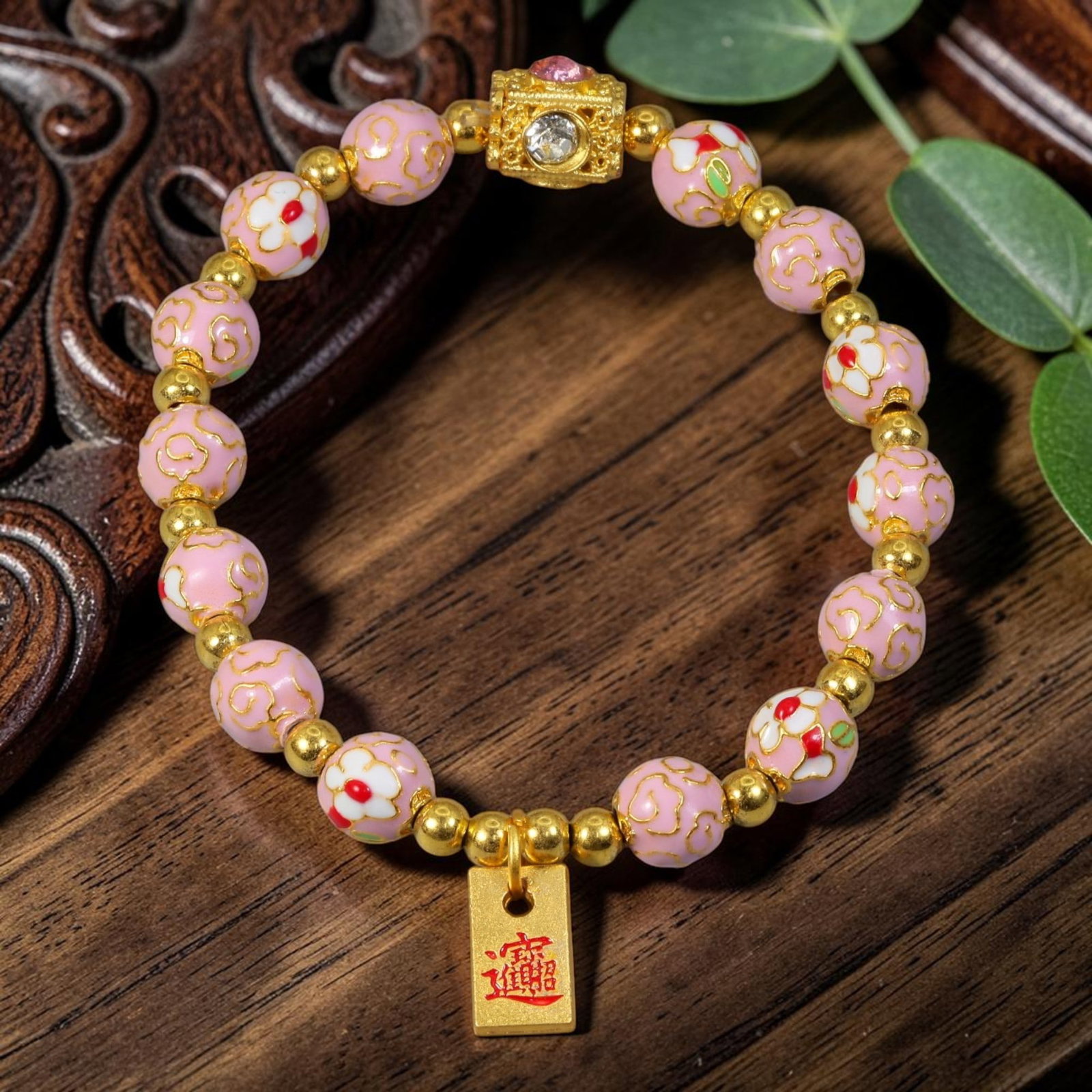 Chinese Cloisonne Enamel Beaded Bracelet - Pink Gold Wealth Ingot Tag Charm, 73YG: This modern Chinese revival stretch bracelet features round cloisonne enamel beads measuring 7.50 millimeters, finished in soft pastel pink enamel with alternating raised gold-tone swirling cloud scro