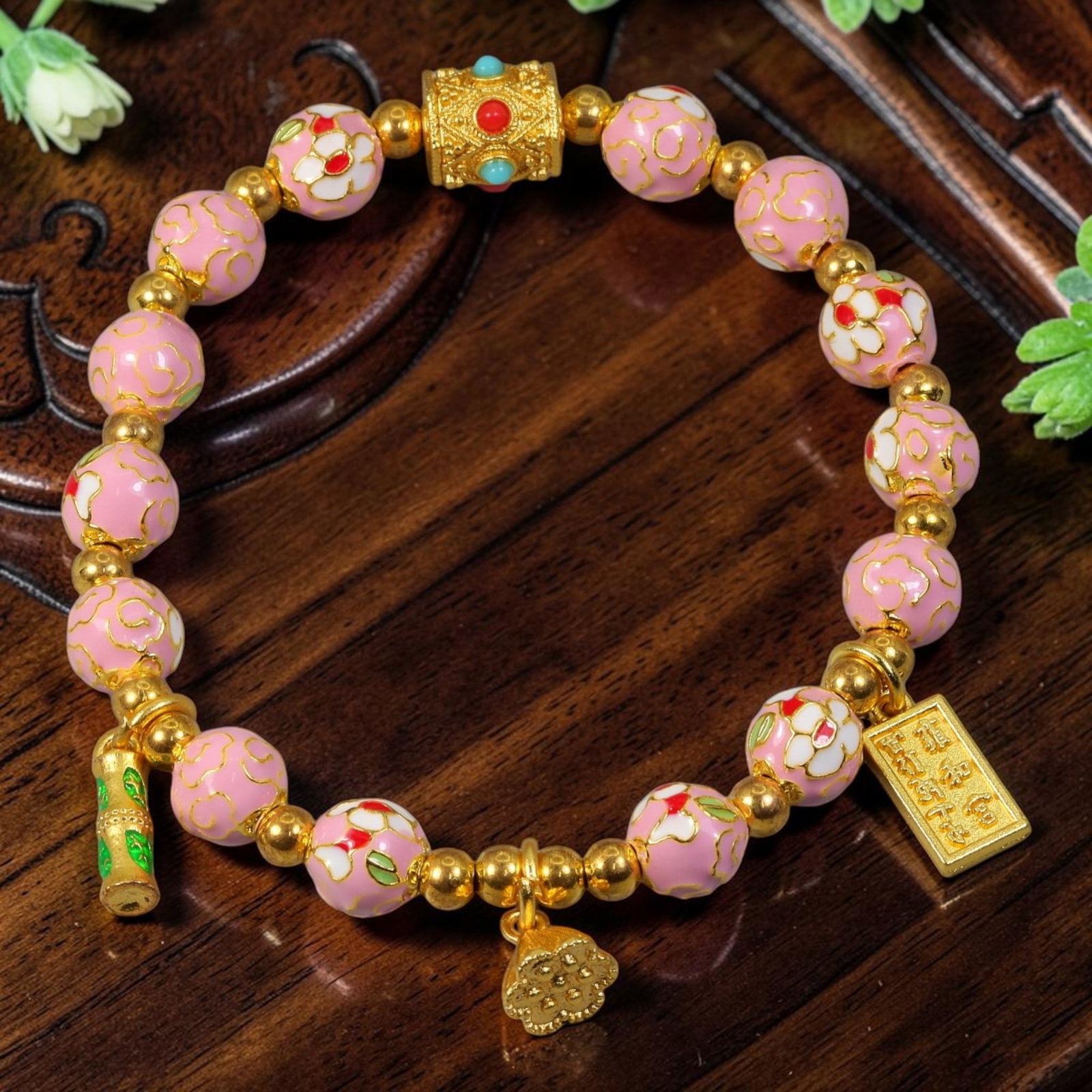 Chinese Cloisonne Enamel Beaded Bracelet - Pastel Pink Multi Gold Auspicious Charms, 61YG: This modern Chinese revival stretch bracelet features round cloisonne enamel beads measuring 7.60 millimeters, crafted in soft pastel pink enamel with alternating raised gold-tone swirling cloud wirew