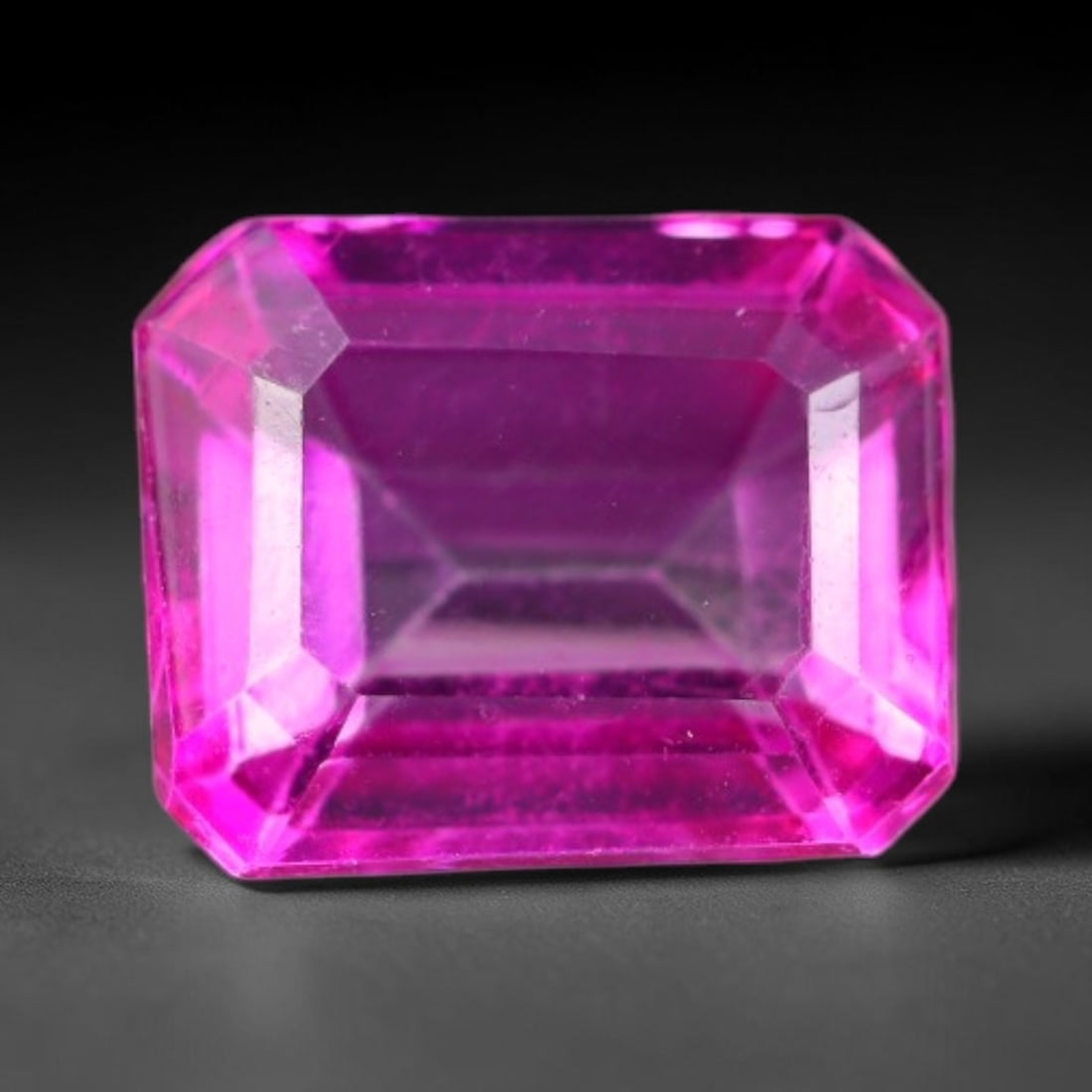 5.32 Carats Natural Vivid Pink Topaz Emerald Faceted Loose Gemstone, 11WS: This crisp emerald faceted pink topaz boasts vivid saturated hot pink color radiating through neatly polished step facets, with faint subtle natural internal fine textures visible within its transpare